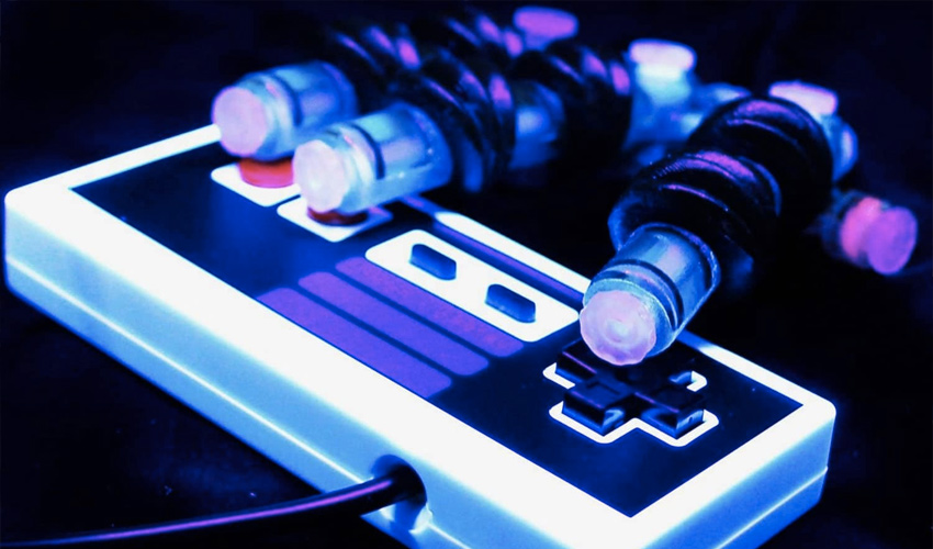 A 3D-Printed Robot Hand Capable of Playing Famous Video Game Super Mario Bros from Nintendo