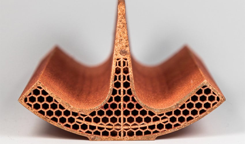 A 3D Printed Copper Radio Frequency Quadrupole (RFQ) Component for the Large Hadron Collider