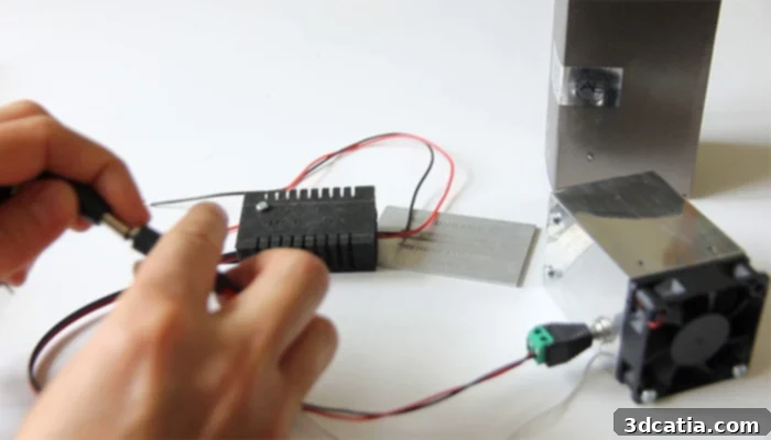 Close-up of Endurance Laser module attached to a 3D printer