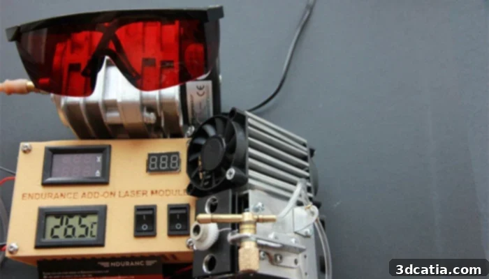 Person wearing safety goggles operating an Endurance Laser on a material