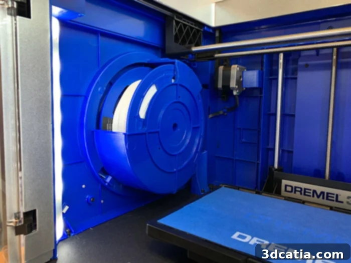 Filament reel integrated inside Dremel 3D40 printing chamber