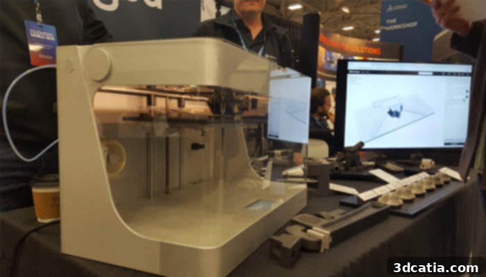 Markforged Mark Two 3D printer actively printing a composite part