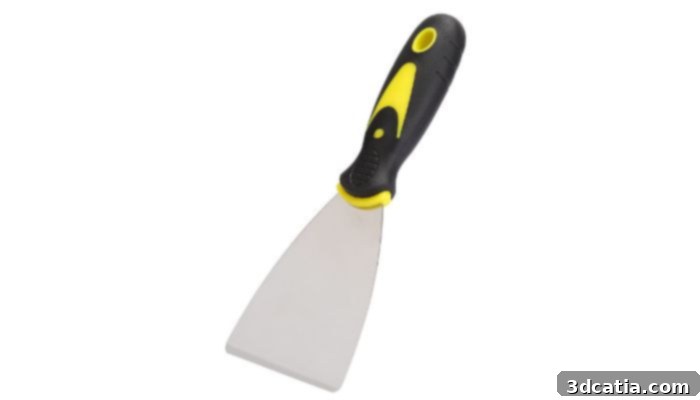 3D printing spatula removing a print from the build plate
