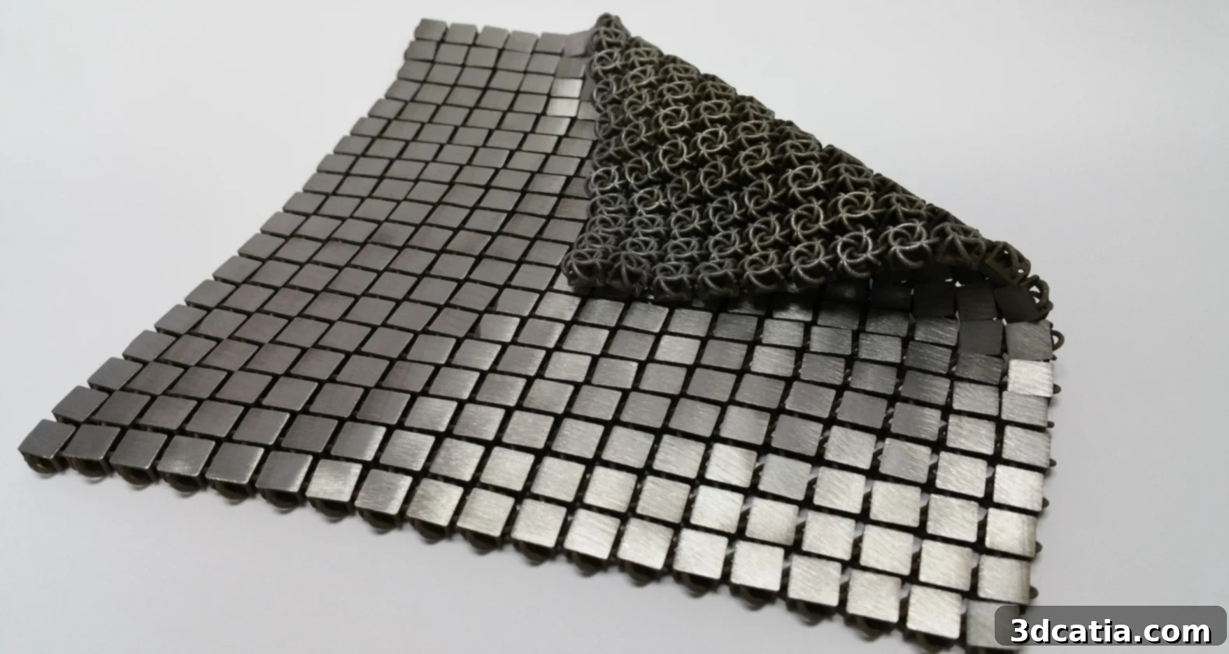 NASA's Space Fabric showing its dual-functionality: one side reflects light for thermal management, the other absorbs light for insulation.