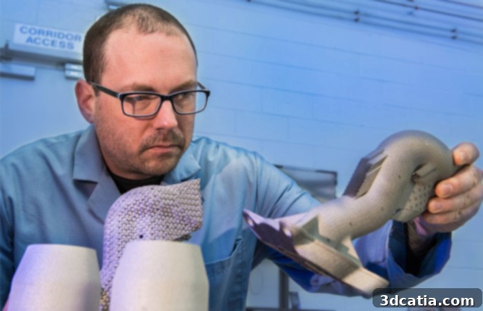 David McWilliams, head of the laboratory’s science and technology branch, inspecting a component.