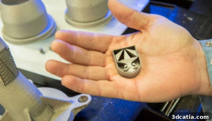 A 3D printed metal part, possibly a fan rotor, being examined.