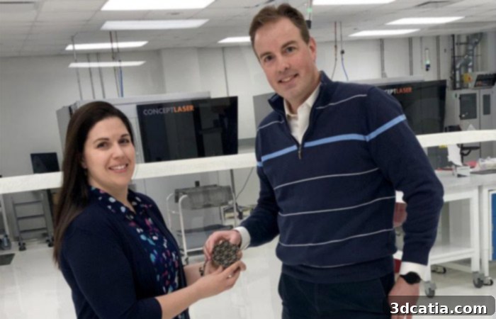 GE Research team members Laura Dial and Peter DeBock discussing the heat exchanger project