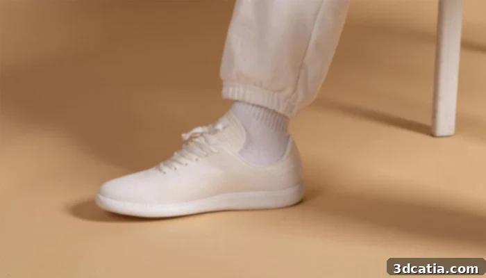 Oliver Cabell Phoenix black trainers in a dynamic shot, emphasizing style and comfort.