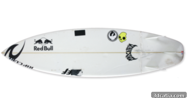 Mick Fanning with his original surfboard, a traditional design.