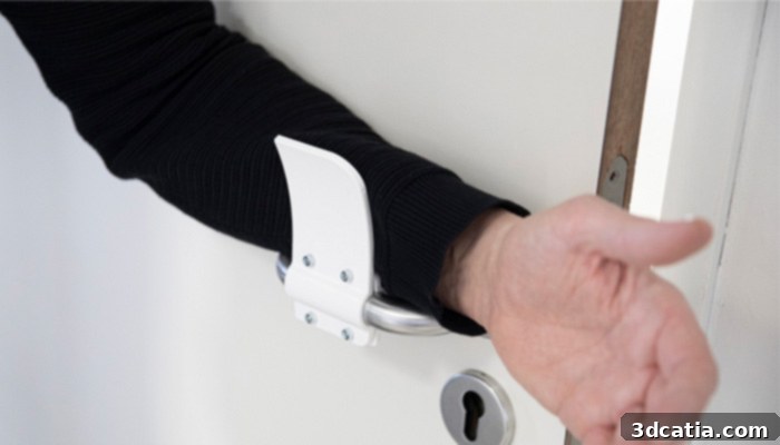 Materialise 3D printed door opener designed to prevent Coronavirus spread by eliminating direct contact with door handles.