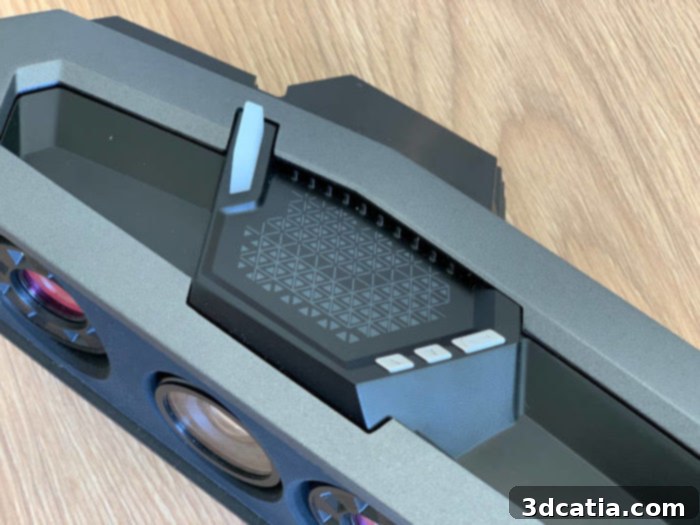 Go!SCAN 3D's intuitive control buttons on the front panel, allowing users to start, pause, and adjust zoom during scanning for enhanced workflow efficiency and direct device control.