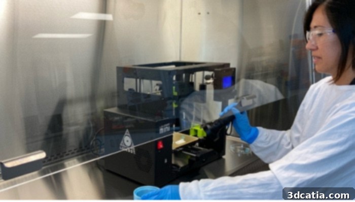 UNSW scientist preparing to 3D-print a bone part using COBICS technique