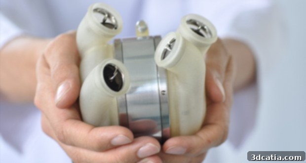 3D printed silicon heart with internal chambers visible, showcasing advanced biomedical engineering