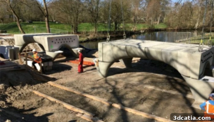 Installation of the 3D printed concrete bridge in Nijmegen, showing sections being assembled on-site.