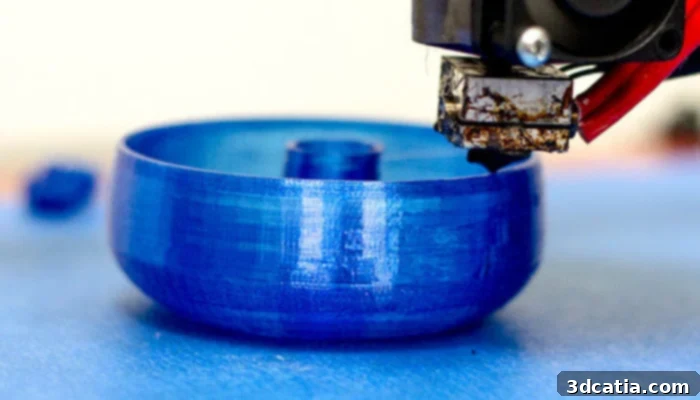 A 3D printer actively producing a part from PLA filament, highlighting the printing process and material in action.