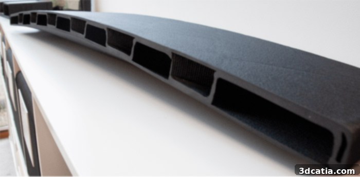 Prototype of a bridge part, 3D printed using advanced fiberglass composite materials for structural integrity.