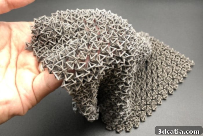 A 3D-printed structured fabric component, similar in design to the nylon version but fabricated in aluminum, signifying the material transition in the research. (Photo Credit: NTU)