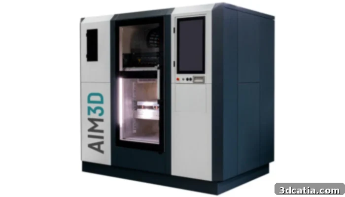 The AIM3D ExAM510 multi-material pellet extrusion 3D printer, showcased at Formnext in its advanced prototype stage, demonstrating its large build volume.