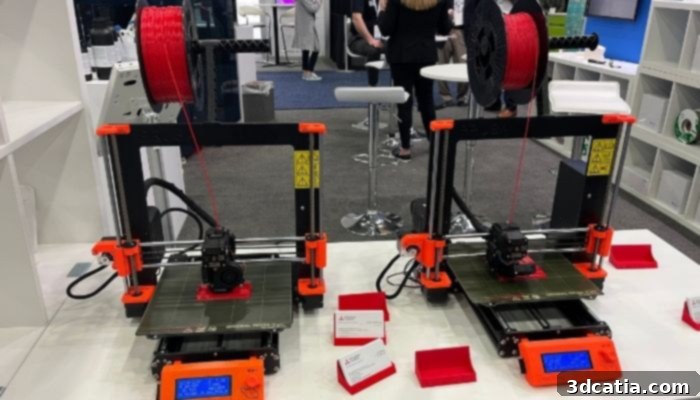 An industrial FDM 3D printer showcasing advanced features at RAPID + TCT 2022.
