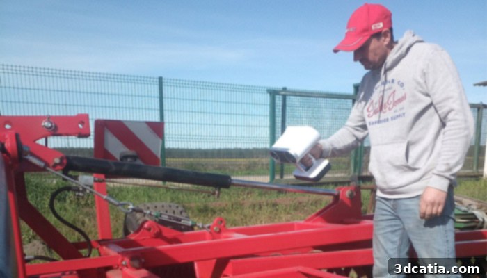 Agricultural machinery being improved with custom parts, thanks to 3D scanning technology. This photo shows enhanced farm equipment.