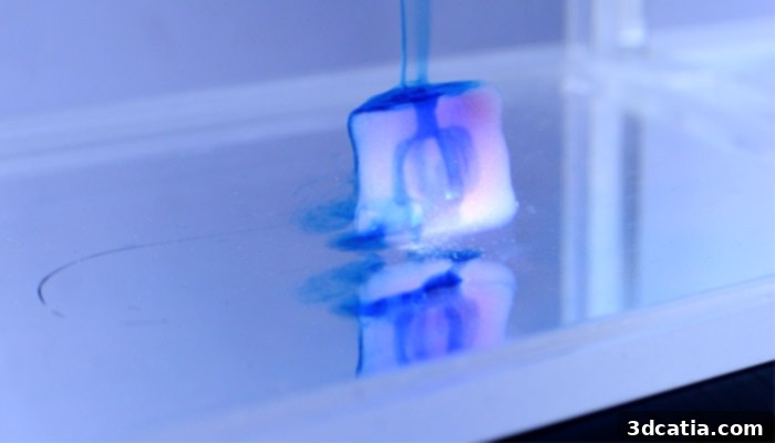 Volumetric 3D printing process with opaque resin at EPFL