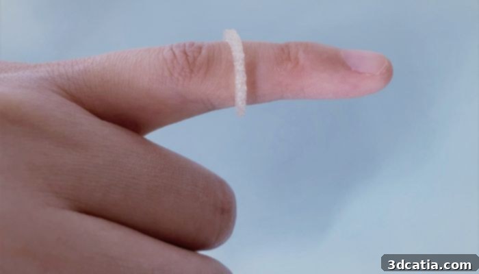 3D-printed mosquito repellent wearable ring in a lab setting
