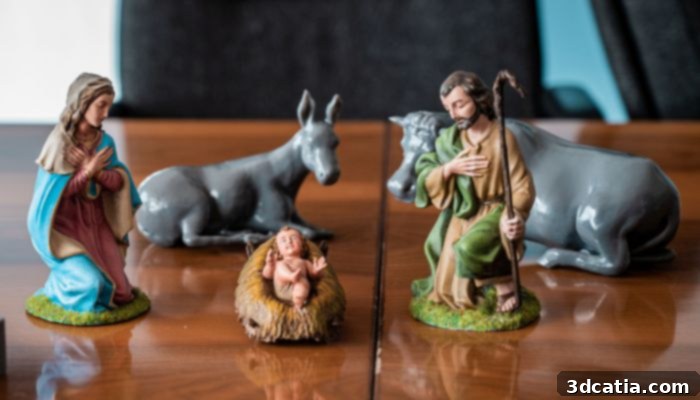 Close-up of three hand-painted components of the 3D printed nativity, highlighting artistic detail.