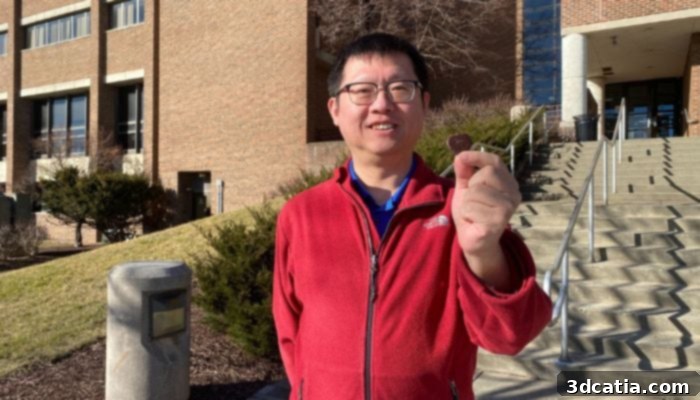 Professor Qingrong Huang showcasing a piece of his 3D printed low-fat chocolate