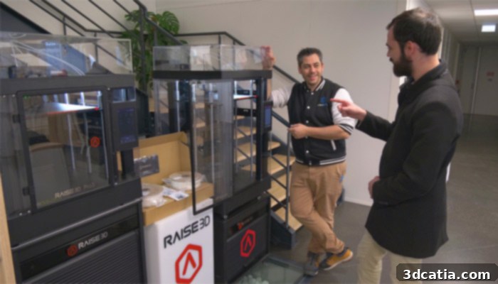 A modern 3D printing showroom setup with various printers.