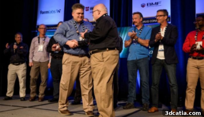 Mark Wynn receiving the President’s Award at AMUG 2023 for his exceptional service and leadership in additive manufacturing.