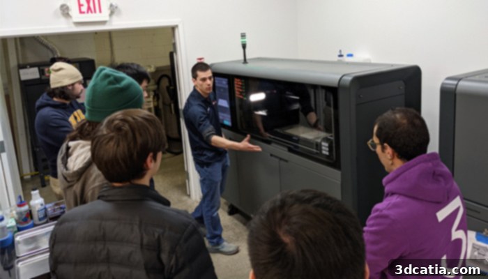 Peter Genovese advising Drexel Electric Racing students at SolidCAM's facility