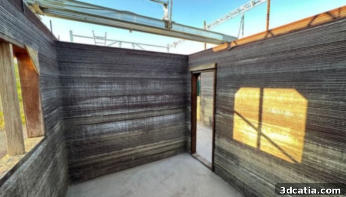 The world's first 3D printed geopolymer house standing complete, showcasing innovative and sustainable construction.