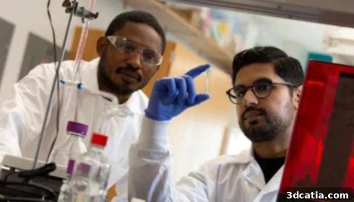 Penn State researchers James Godwin and Kassem Bokhari test the strength of a 3D printed part made with the new plant-based resin.