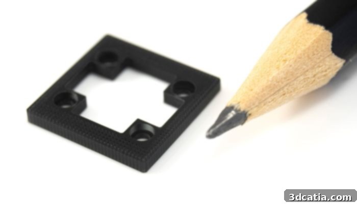 Microscale parts showcasing the ultra-high precision capabilities of Boston Micro Fabrication's additive manufacturing solutions.