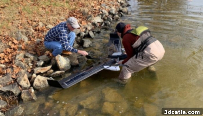 MITRE engineers Dave Sheffler and Tyler Paige prepare to deploy Hopper at Lake Anna State Park in Virginia.