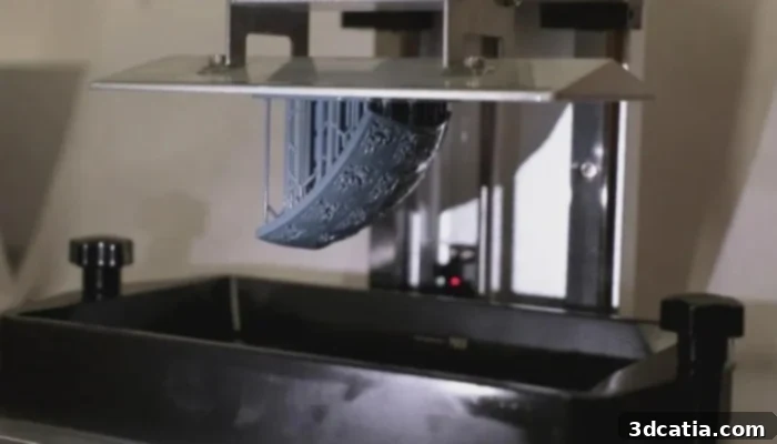Cuttlefish-inspired composite material being handled by a researcher.