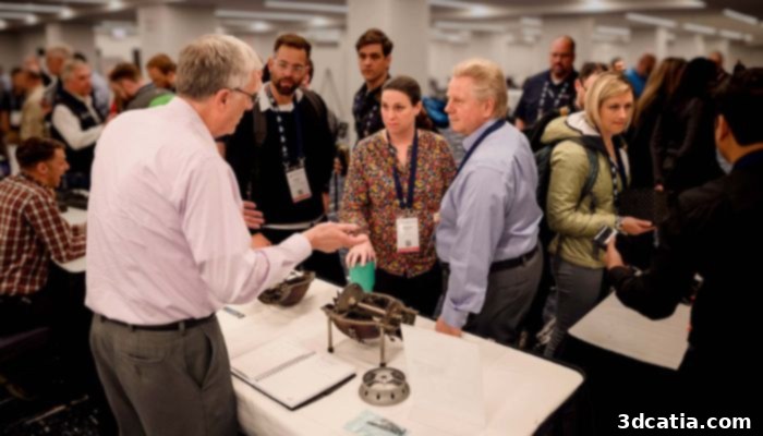 Attendees networking at AMUG conference