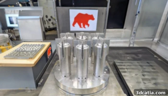 A display of various small prototype solid rocket motors, showcasing Ursa Major's advanced manufacturing capabilities.