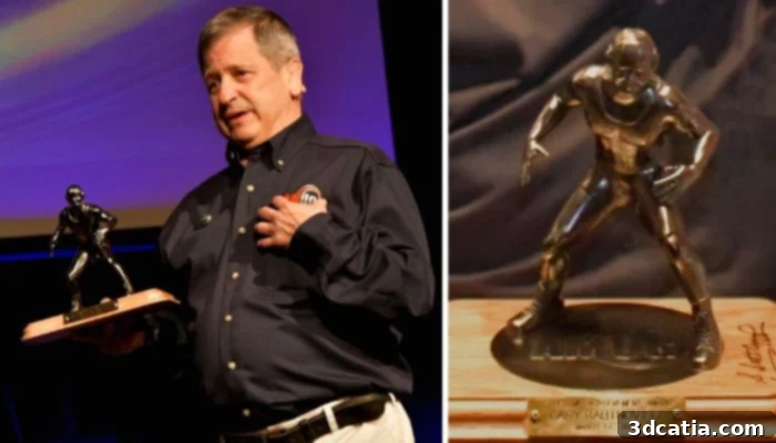 Gary Rabinovitz accepting the AMUG Lifetime Achievement Award, which features a custom wrestling theme, reflecting his passion.
