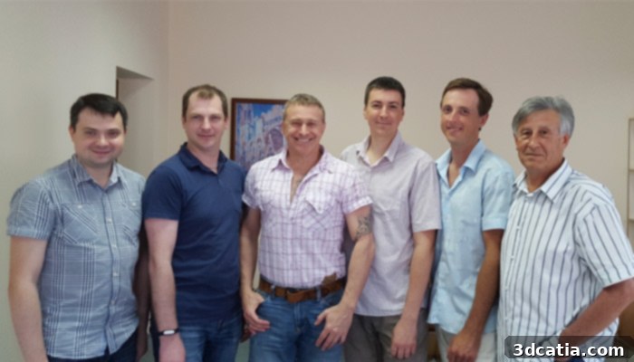 The Sprybuild team in their office, working on 3D printing innovations.