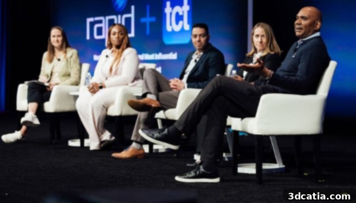 Industry leaders discussing 3D printing trends at a conference