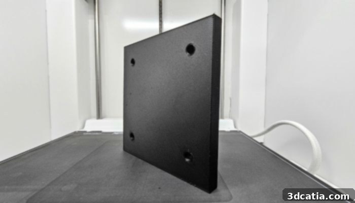 A 3D printed Kevlar shield, showcasing continuous composite extrusion technology for aerospace repair.
