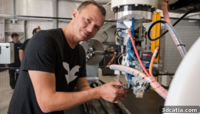 Close-up of a machine working on a composite part for a hydrogen tank, illustrating the manufacturing process.