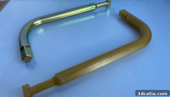Comparison of a metal vehicle manhole key and a polymer version developed by Omni3D