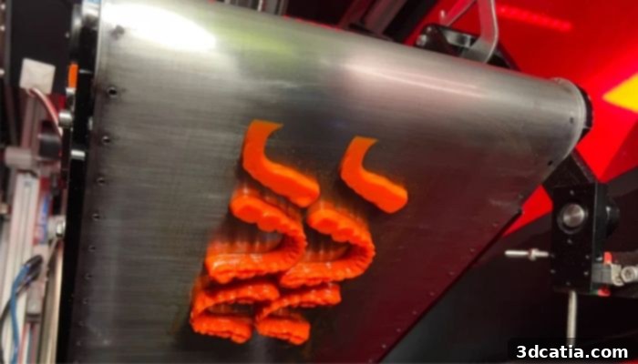 Sprybuild continuous resin 3D printer with conveyor belt