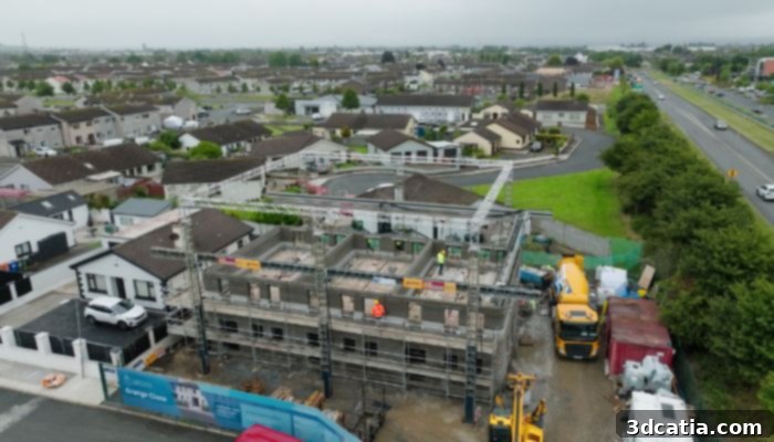 Aerial view of the 3D printed social housing project in Grange Close, Ireland, showcasing modern townhouses.