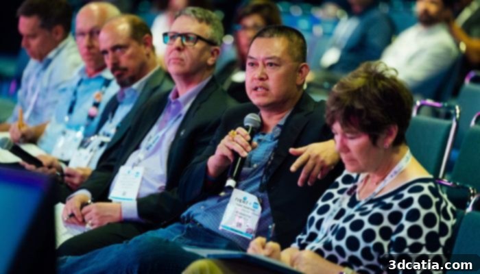 Attendees engaged in a lively discussion during a RAPID + TCT conference session, highlighting knowledge exchange