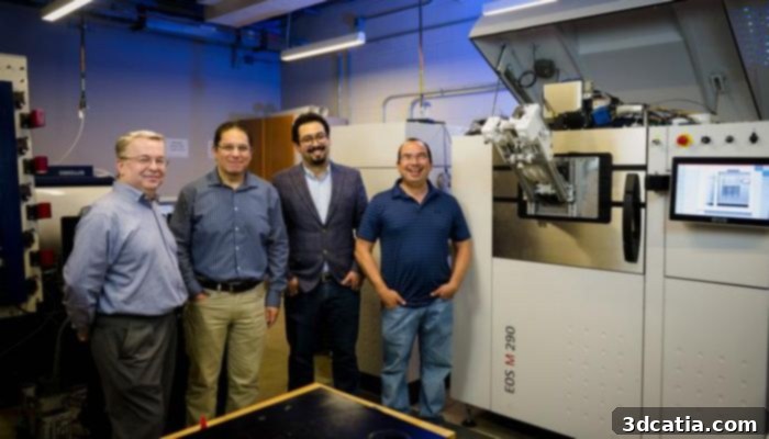 Texas A&M team members next to a metal 3D printer, working on military part lifespan prediction research.