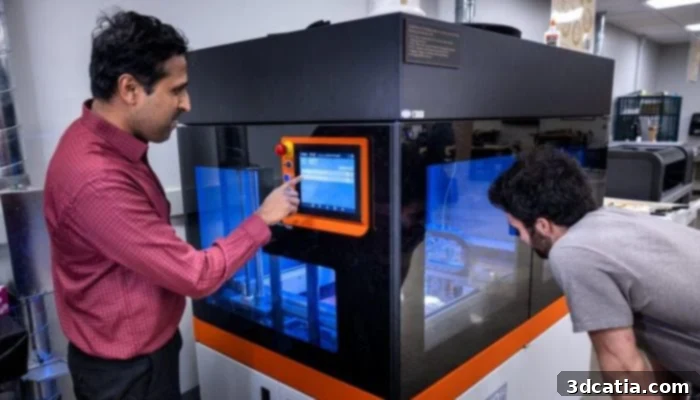 University of Michigan team members working with a 3D printer for the PRIME project.