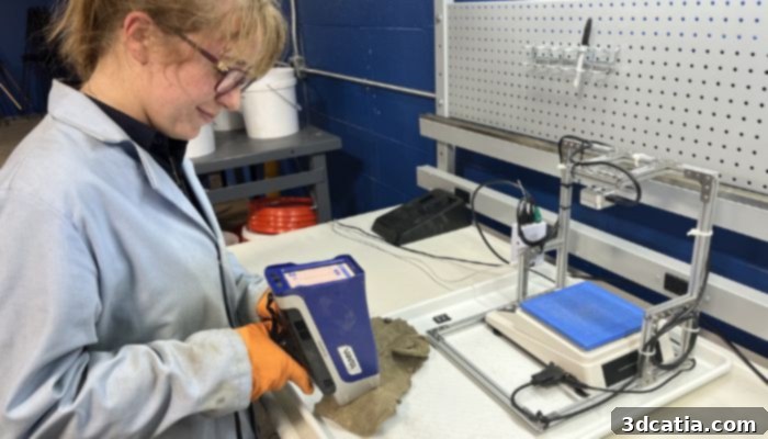 VALIS team member evaluating metal for 3D printing